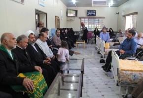 تجلیل خادمان حرم رضوی از جانبازان استان یزد