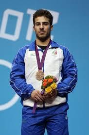 خانواده شهیدی که به کیانوش رستمی مدال طلا دادند