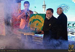 پرچم حرم امام رضا(ع) در میان رزمندگان عراقی +عکس