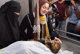 وداع تکان دهنده یک دختر با نامزد شهیدش + عکس