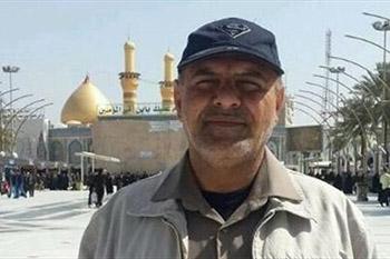 اهدا پرچم امام حسین(ع) و حضرت عباس(ع) به خانواده «سردار مدافع حرم»