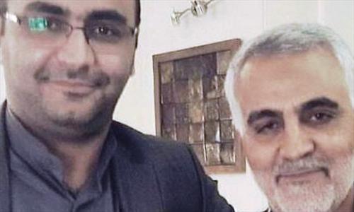 عکس/ پسر شهید همت در کنار حاج قاسم