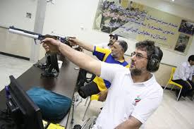 تيراندازان جانباز و معلول در مجموعه آزادي تمرين مي‌كنند